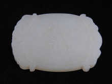 A Chinese jade plaque carved in