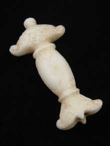 A carved marble Mughal dagger handle  14eacb