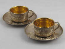 A pair of Russian silver cups and