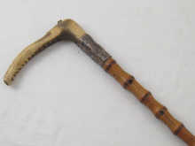 A silver mounted bamboo riding crop