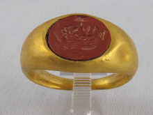 A yellow metal (tests high carat