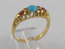 A 18 ct gold gem set ring hallmarked