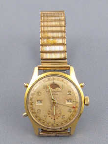 A gold plated full calendar gents wrist