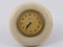 A small gilt metal strut clock 14eb5d