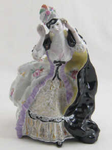 A Russian ceramic figure of a lady 14eb86