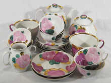 A Russian hand painted floral tea set