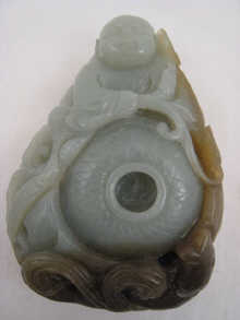 A Chinese jade pendant carving composed