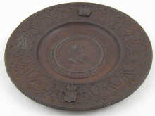 A cast iron Russian plate celebrating 14ebaf