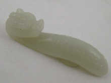 A Chinese white jade belt hook