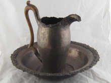 A large hand raised silver plated jug