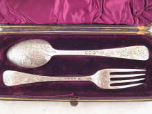 A boxed matched silver spoon and fork