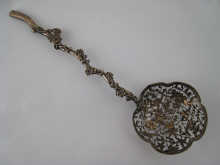 A Chinese silver serving spoon
