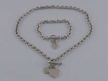 A white metal (tests silver) necklace