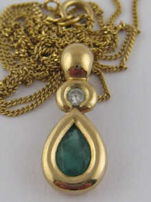 A 9 carat gold pendant set with 14efdf