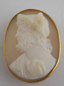 A small cameo of a classical figure