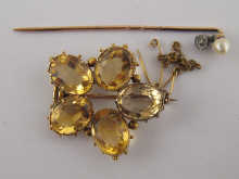 A yellow metal (tests 15 carat