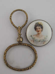 A hand painted porcelain plaque brooch