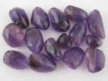 A quantity of faceted amethyst beads