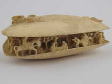A Chinese ivory carving designed
