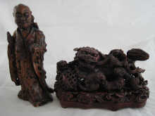 A carved figure of an Oriental ht. 22cm