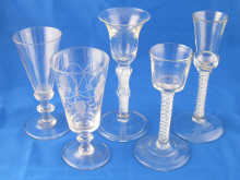 A group of five glasses including