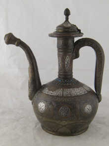 An Islamic coffee ewer of traditional