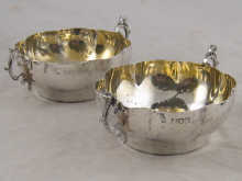A pair of silver lobed bowls with