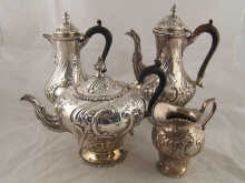 A late Victorian four piece silver