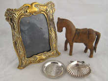 Two small silver dishes and a fork