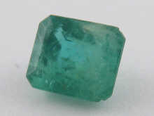 A loose polished emerald approx.