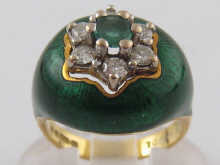 A hallmarked 18 carat gold green