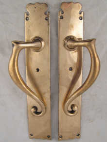 A pair of heavy brass or bronze