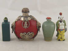 Four ceramic Chinese snuff bottles including