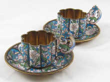 A pair of Russian enamelled silver