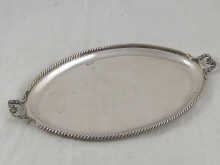 A two handled oval silver serving tray