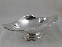 A shaped silver fruit dish marked 800.