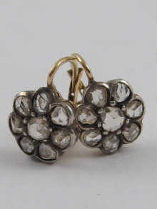 A pair of rose cut diamond cluster earrings