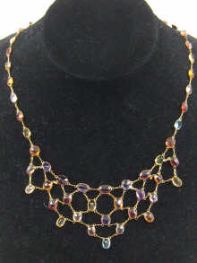 A multi gem necklace set in yellow 14f27a