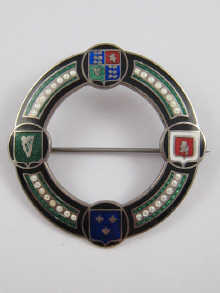 A Norwegian silver circular badge enamelled