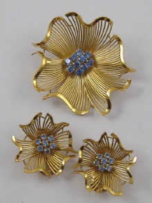 A yellow metal (tests 18 ct gold) brooch