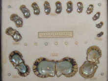 A Mikimoto framed example of the