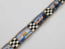 An enamel on silver bracelet the panels