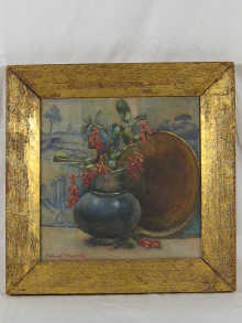 A framed watercolour still life signed