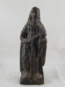 A medieval carved wooden figure
