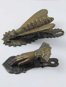 an unusual brass Victorian note clip