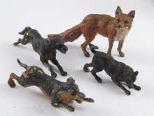 Four cold painted bronzes being a fox