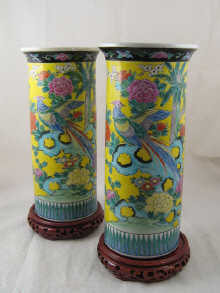 A pair of Chinese vases on wooden