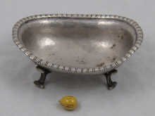An oval silver footed dish with 14f342