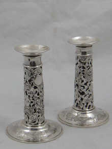A pair of Chinese silver candlesticks 14f341