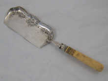 An ivory handled crumb scoop Sheffield